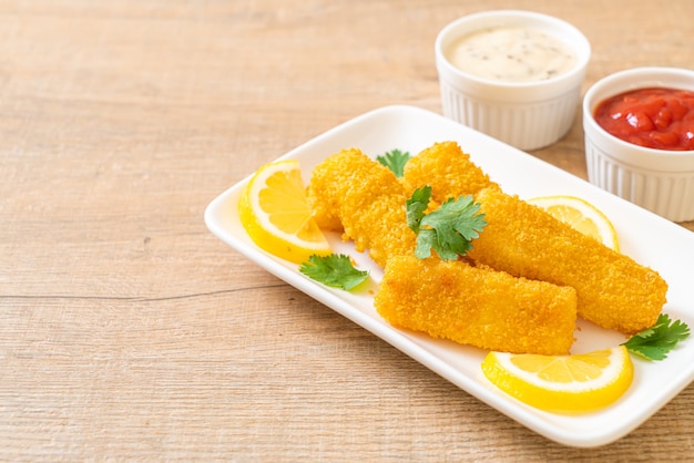 fried fish finger sticks with sauce