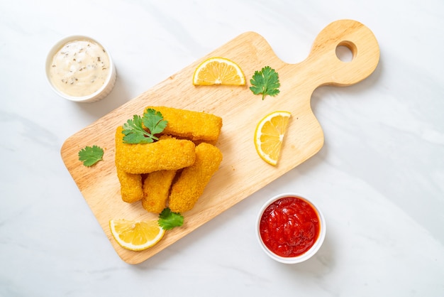 Fried fish finger sticks with sauces