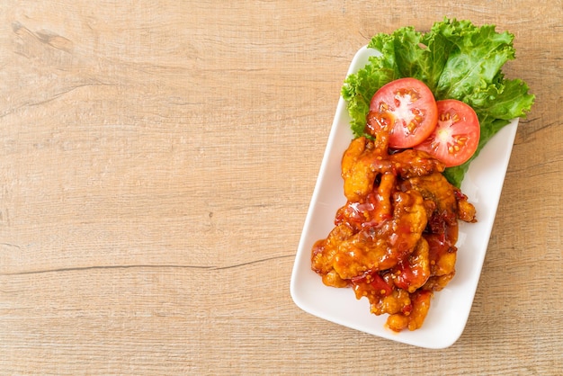 Fried fish topped with 3 flavors chili sauce