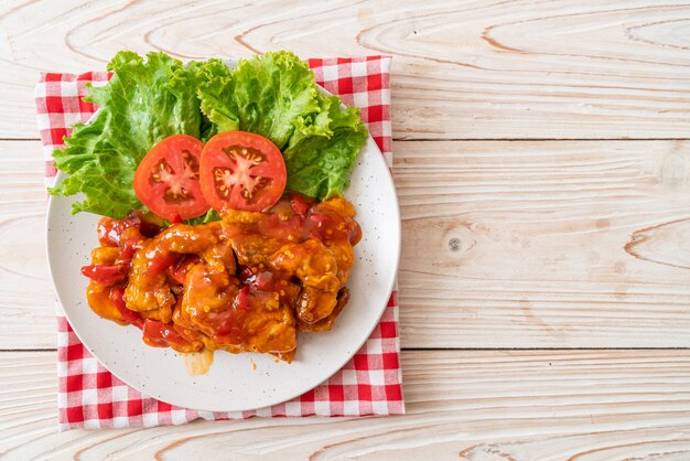 Fried fish topped with 3 flavors (sweet, sour, spicy) chili sauce