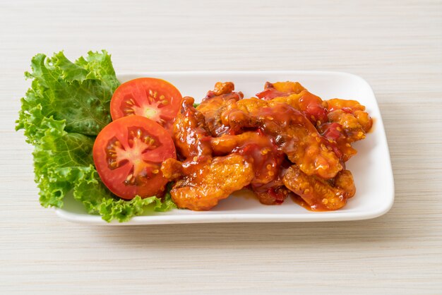 Fried fish topped with 3 flavors (sweet, sour, spicy) chili sauce