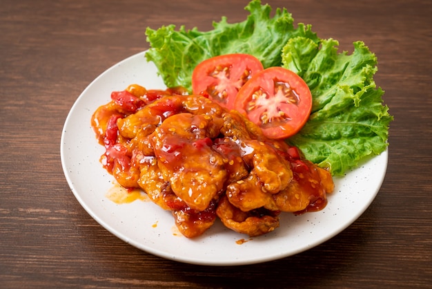 Fried fish topped with 3 flavors (sweet, sour, spicy) chili sauce