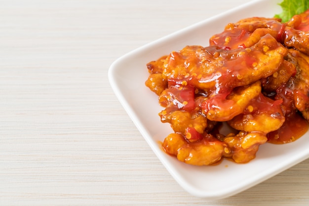 Fried fish topped with 3 flavors (sweet, sour, spicy) chili sauce