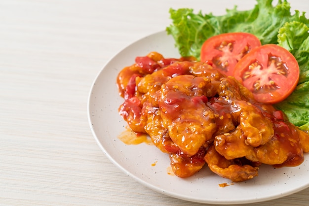 Fried fish topped with 3 flavors (sweet, sour, spicy) chili sauce