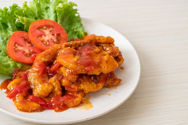 Fried fish topped with 3 flavors (sweet, sour, spicy) chili sauce