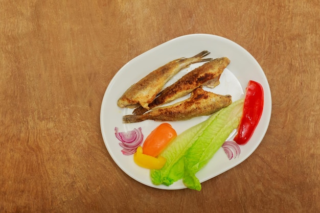 Fried fish with fresh herbs and lemon fried fish