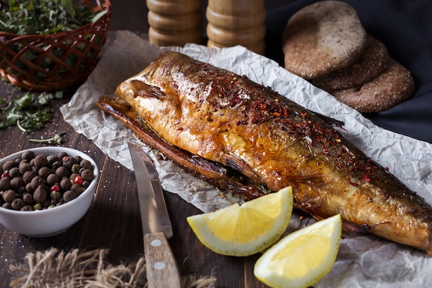 Fried fish with lemon and pepper