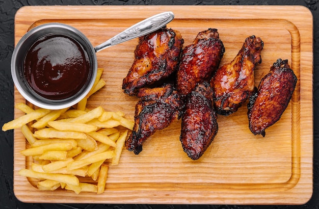 Fried glazed chicken wings and legs