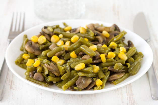 Fried green beans with mushrooms and corn