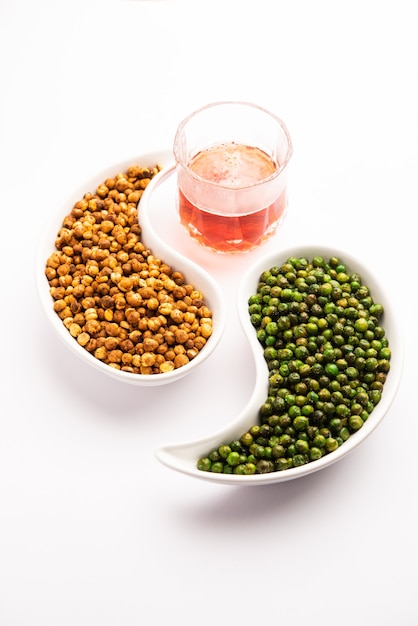 Fried Green peas with chana or futana fry. Popular side dish or snack or chakna with hard drinks in India