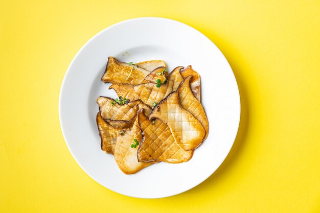 fried grill eryngii slice oyster mushroom king mushrooms eringi meal snack on the table copy space