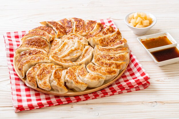 fried gyoza or dumplings snack with soy sauce