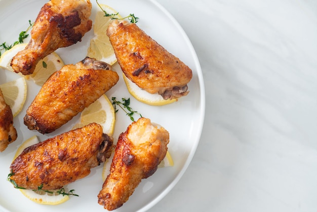 fried lemon pepper chicken wings with thyme