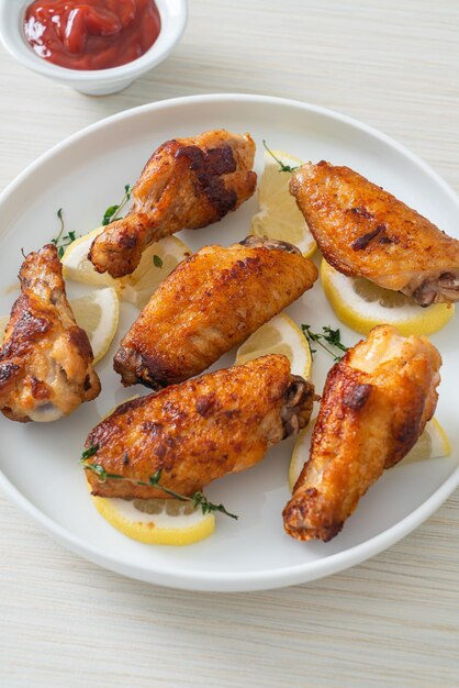 fried lemon pepper chicken wings with thyme