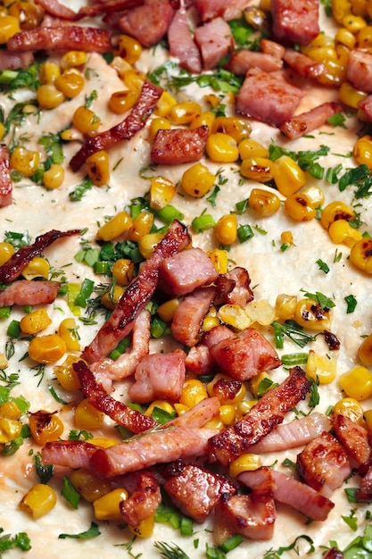 Fried meat with corn on pita bread