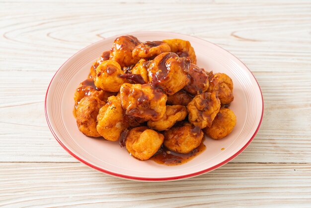 fried meatballs with spicy dipping sauce - Thai street food style