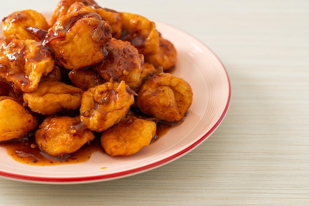 Fried meatballs with spicy dipping sauce