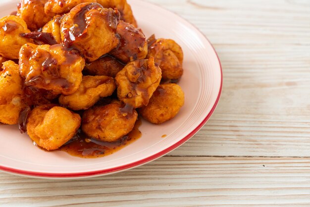 Fried meatballs with spicy dipping sauce