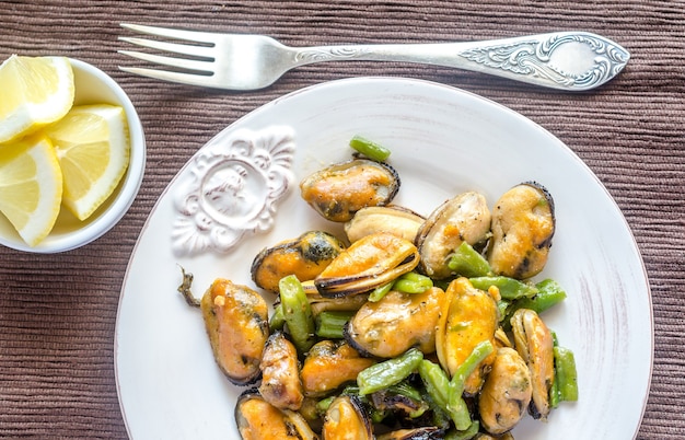 Fried mussels on the plate