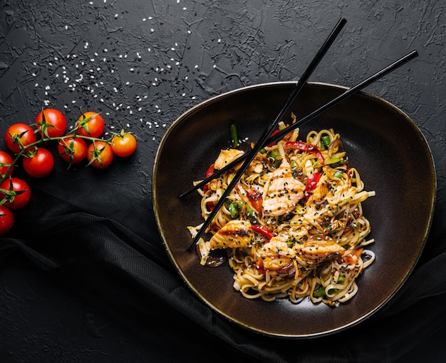 Fried noodles with chicken and vegetables chicken chow mein