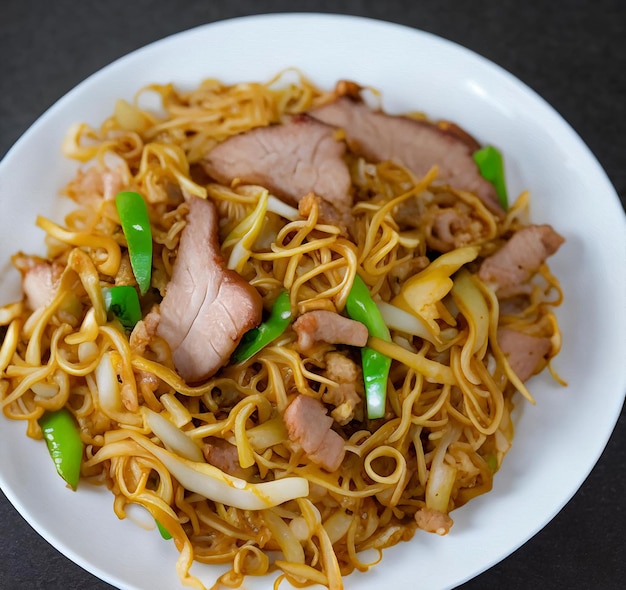 Photo fried noodles with meat and vegetables