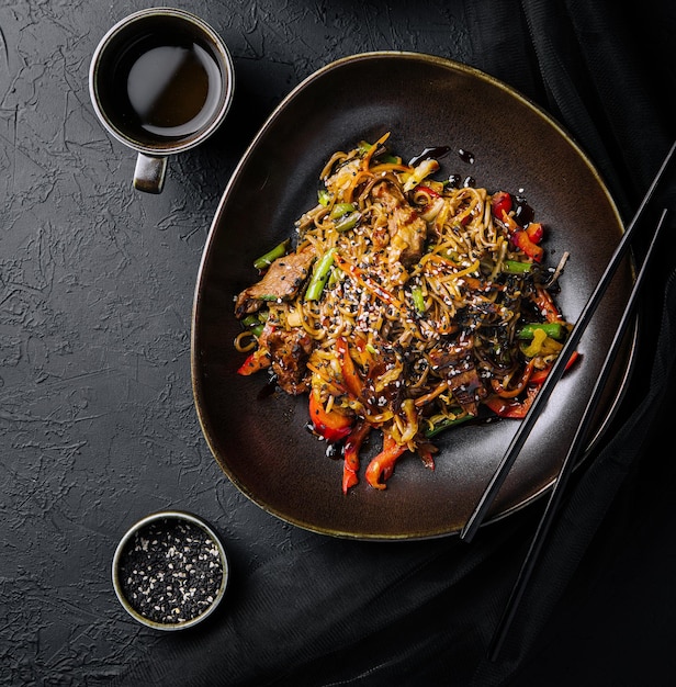 Fried noodles with veal and vegetables