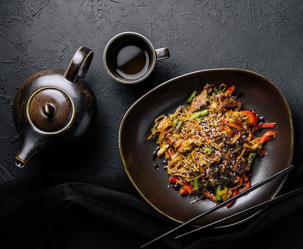 Fried noodles with veal and vegetables