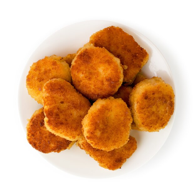 Fried nuggets in a plate isolated