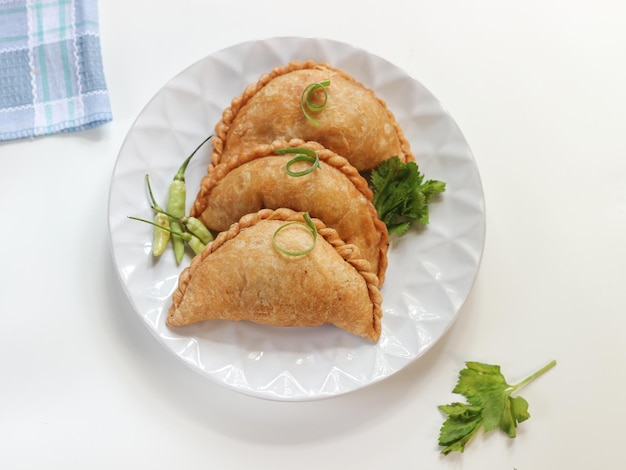 Fried pastels atau Pastel Goreng on white plate