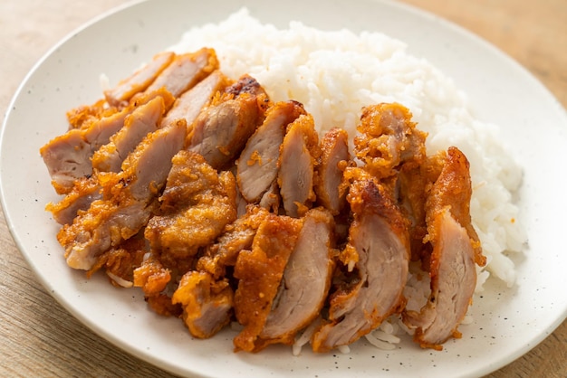 fried pork topped on rice with spicy dipping sauce