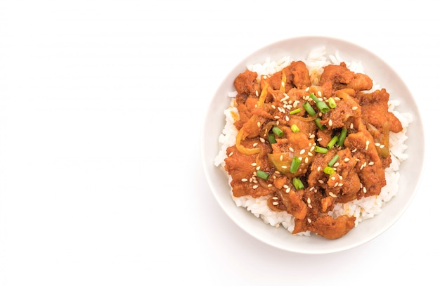 fried pork with spicy korean sauce (bulgogi) on top rice