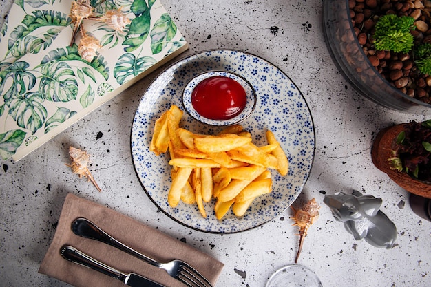 Fried potato wedges with ketchap snack