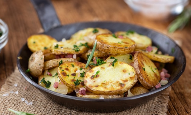 Fried Potatoes on a wooden table selective focus