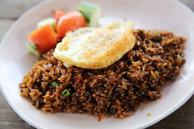 Fried rice nasi goreng with chicken and vegetables