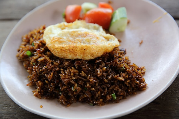 Fried rice nasi goreng with chicken and vegetables