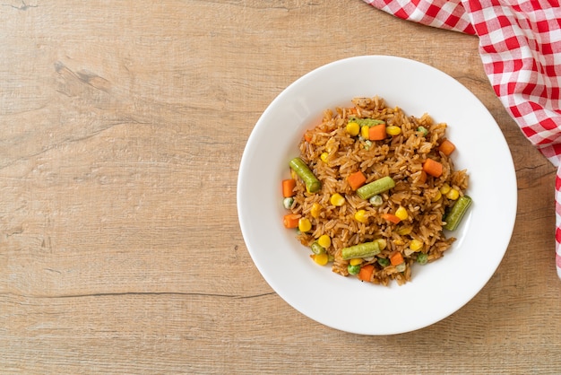 fried rice with green peas, carrot and corn - vegetarian and healthy food style