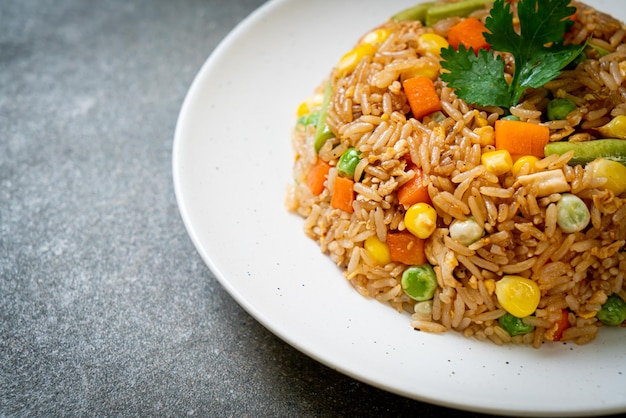 fried rice with green peas, carrot and corn - vegetarian and healthy food style