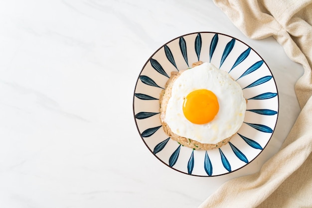 fried rice with pork and fried egg in Japanese style - Asian food style