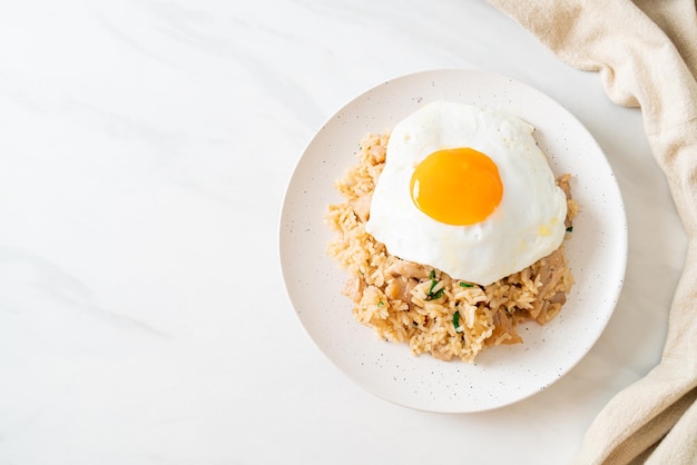 fried rice with pork and fried egg in Japanese style - Asian food style