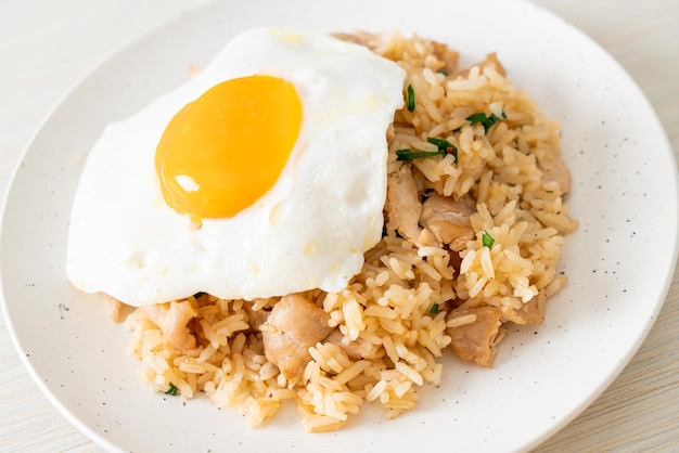 fried rice with pork and fried egg in Japanese style - Asian food style