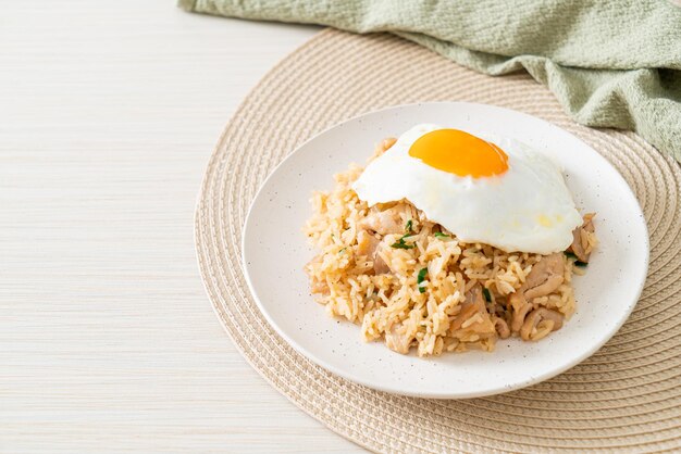 Fried rice with pork and fried egg in Japanese style