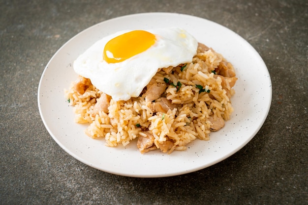 Fried rice with pork and fried egg in Japanese style