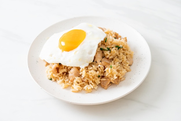 fried rice with pork and fried egg in japanese style