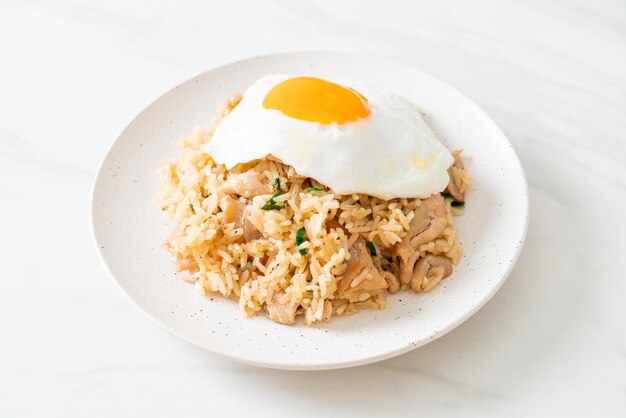 fried rice with pork and fried egg in japanese style