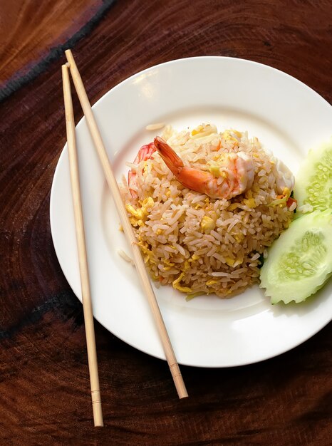 Fried rice with seafood and sliced cucumber