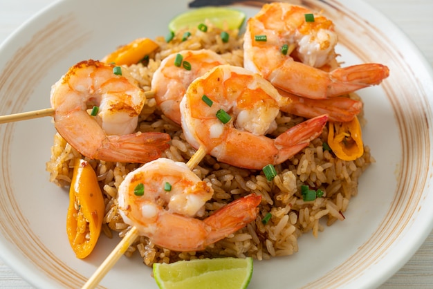 fried rice with shrimps or prawns skewers