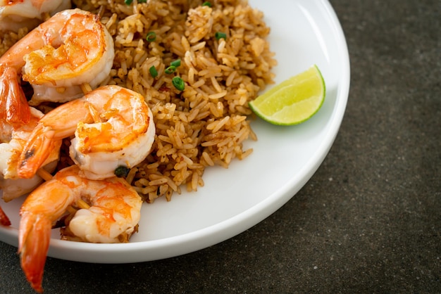 fried rice with shrimps or prawns skewers