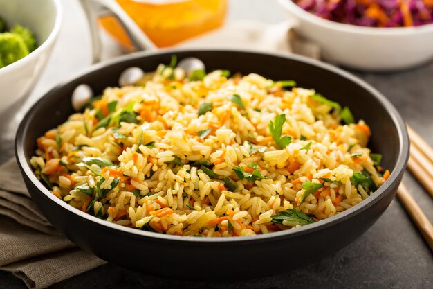 Photo fried rice with vegetables and steamed broccoli