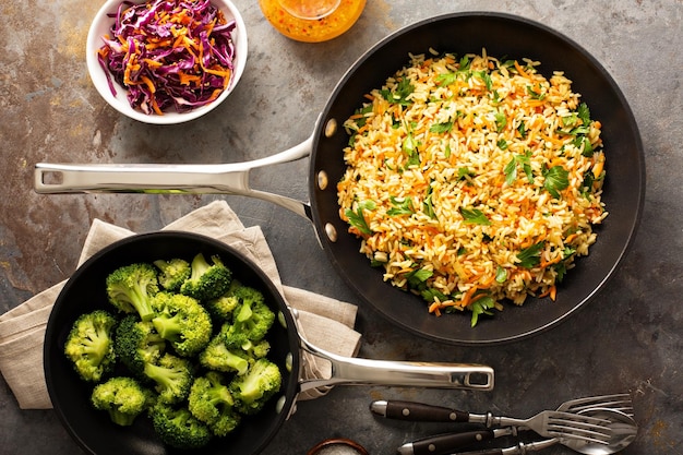 Fried rice with vegetables and steamed broccoli