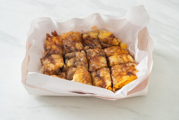 fried roti with egg, banana and chocolate